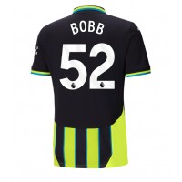 Camisa de Futebol Manchester City Oscar Bobb #52 Equipamento Secundário 2024-25 Manga Curta